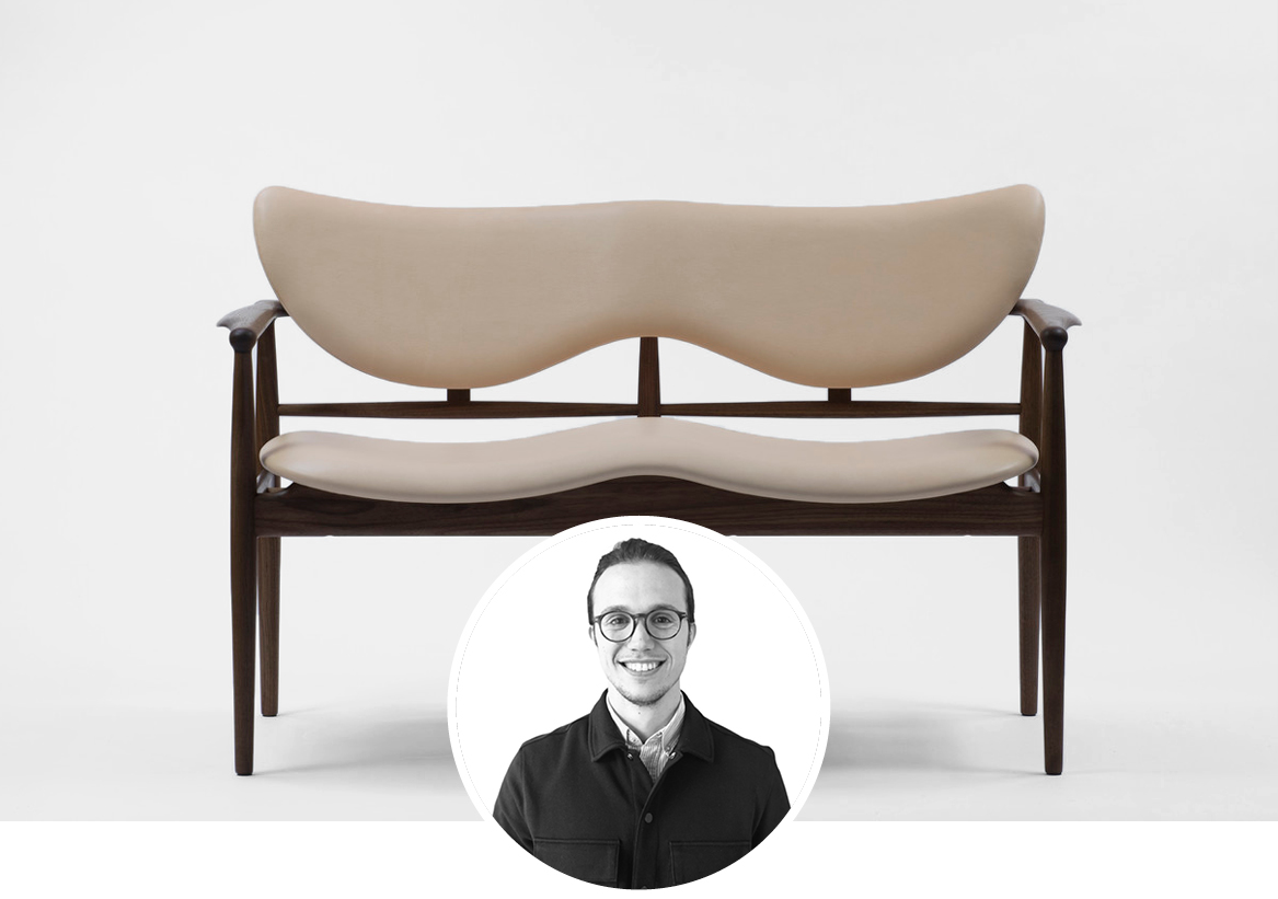 Finn Juhl 48 Sofa Bench upholstered in white leather in white background